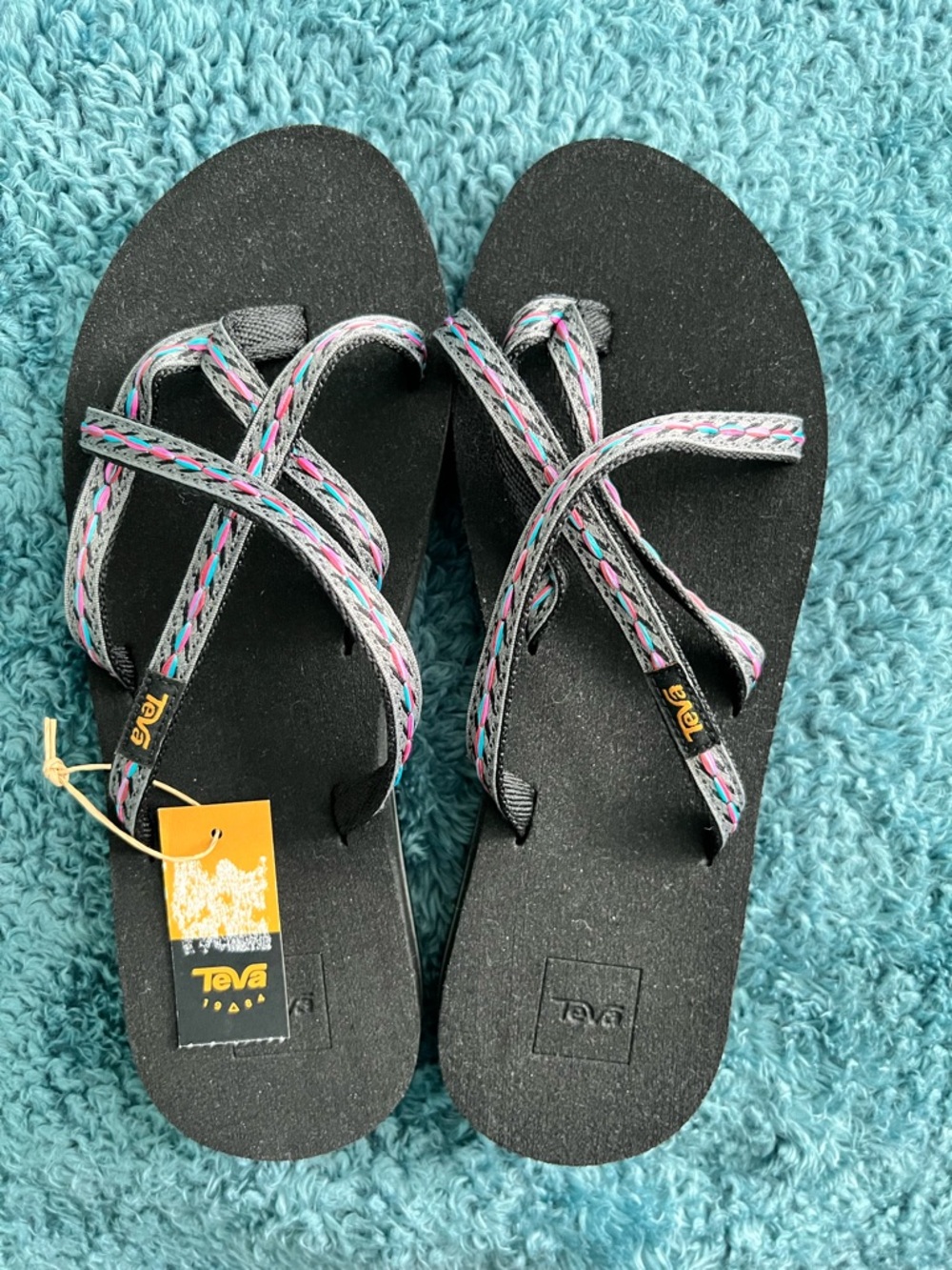 Teva Black Sandals with Pink, Blue and Gray Braided Straps
